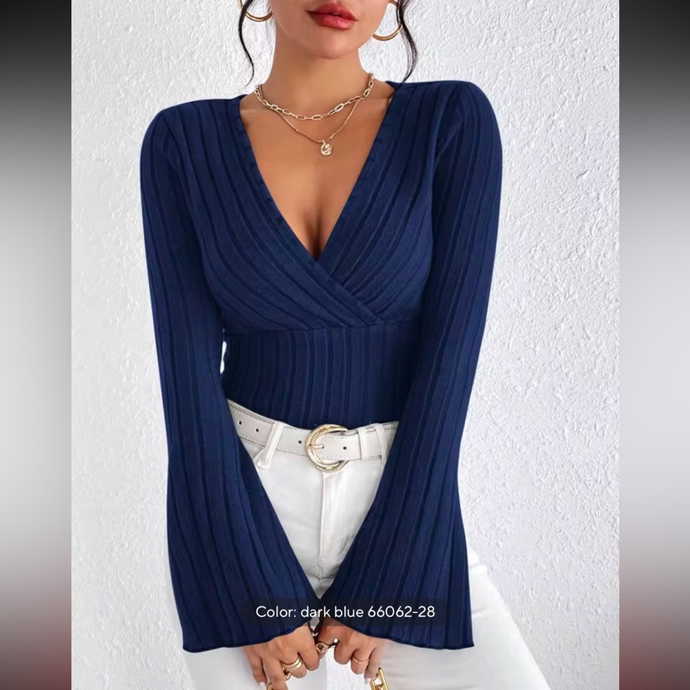 Blue warm long sleeve top with flowy arms. Exactly as pictured